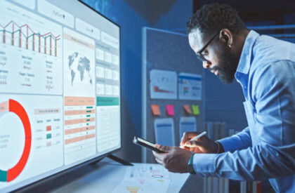 A Man Reviews the Data Analysis of Marketing from Social Media Platforms. A Man Reviews the Data Analysis of Marketing from Social Media Platforms.